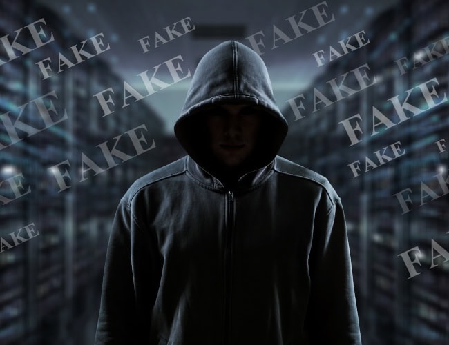 Hacker, propagandist launches fake news. Information war, hybrid war, war in the media space. Cyber warfare, attack, fakes, hackers and cybercrime, phishing, propaganda. By BillionPhotos.com - AdobeStock